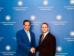 Greek Minister of Health Adonis Georggiadis with AHC Board Member Alexander Mizan after a meeting in Athens in October 2024